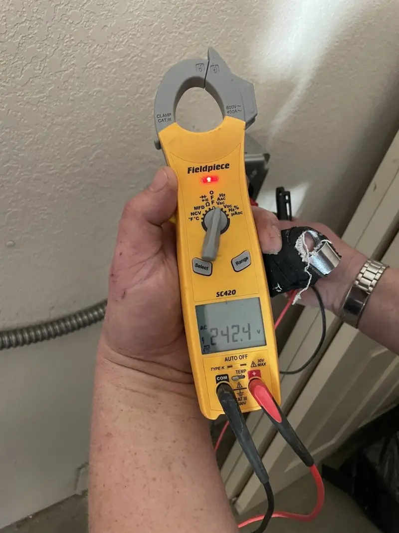 Voltage testing with clamp meter during Electrical Installation Services in Jim Thorpe